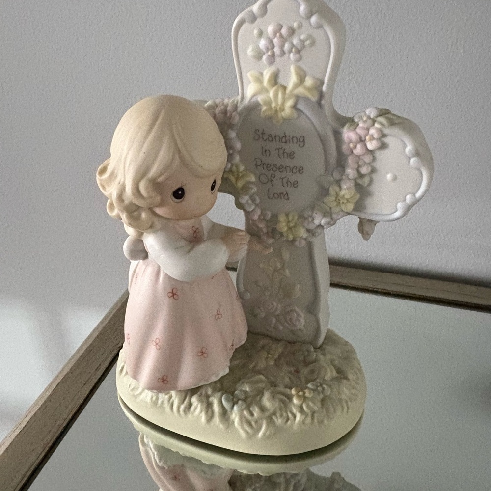 Precious Moments girls cross figurine brand new.